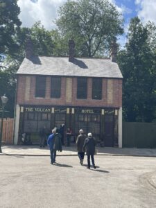 People entering the reconstructed pub highlighting the unique way of saving pubs.