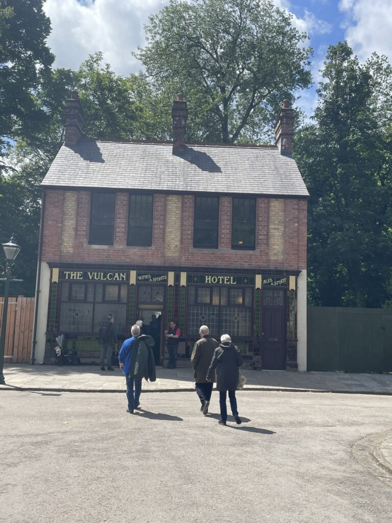 People entering the reconstructed pub highlighting the unique way of saving pubs.