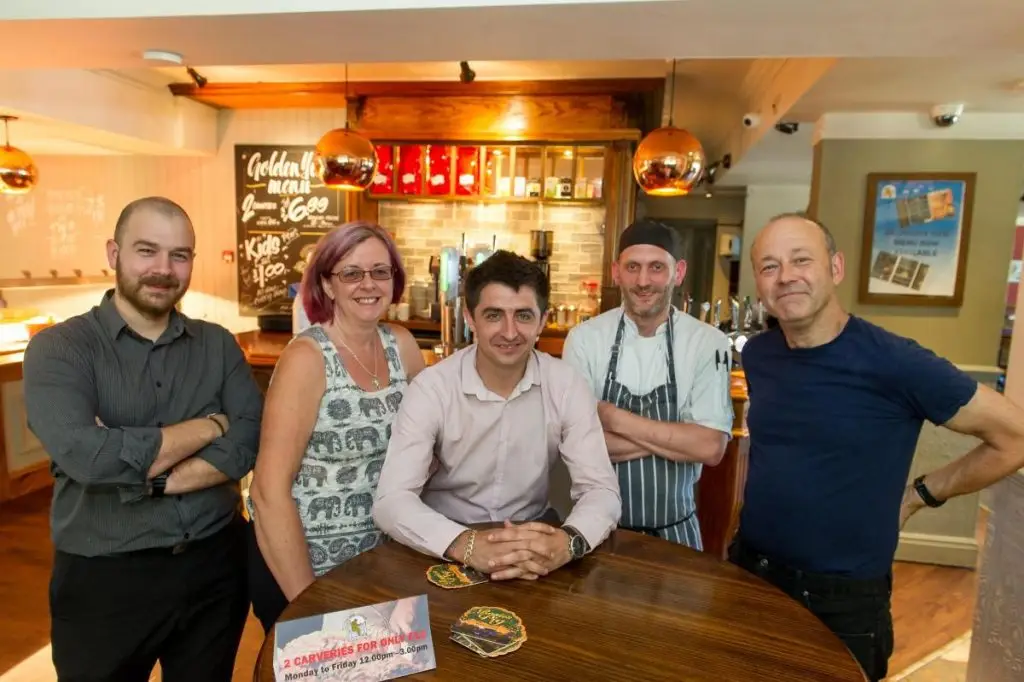 Liz and the team inside the Bedes Lea pub.